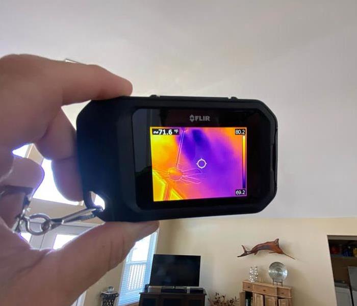 Infrared camera scanning ceiling.